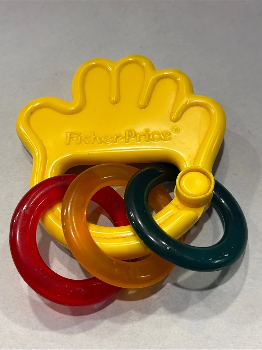 Vintage 1998 Fisher-Price Yellow Hand Rattle with Red, Orange and Green Rings